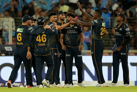 Gujarat Titan players celebrates the wicket of Rajasthan Royals' Shimron Hetmyer during the Indian Premier League cricket match between Gujarat Titans and Rajasthan Royals in Ahmedabad.
