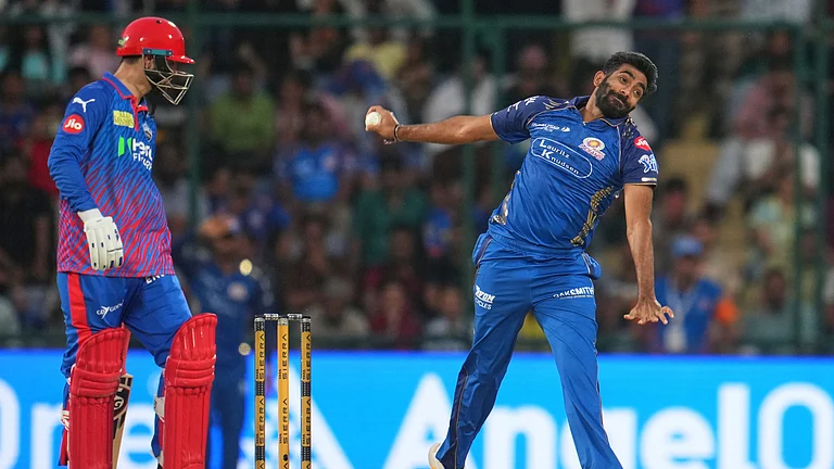 Mumbai Indians' Jasprit Bumrah bowls a delivery during the Indian Premier League cricket match between Delhi Capitals and Mumbai Indians in New Delhi, India, Saturday, April. 4, 2026. - (AP Photo/Manish Swarup)