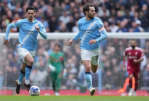 Manchester City's Tijjani Reijnders in action[during the Premier League soccer match between Liverpool and Tottenham in Liverpool, England.
