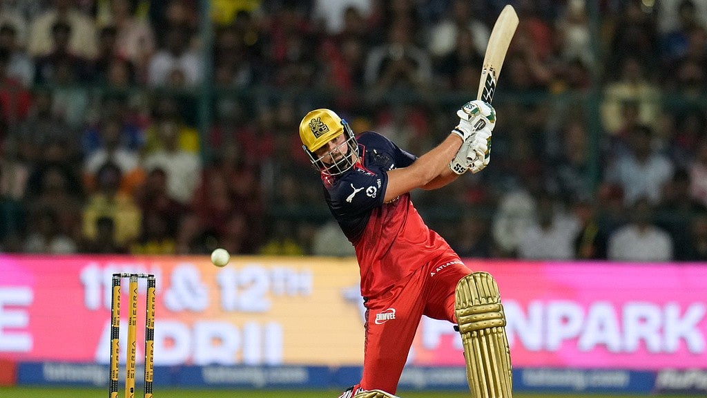 AP : Royal Challengers Bengaluru's Tim David plays a shot during the Indian Premier League match against Chennai Super Kings in Bengaluru.