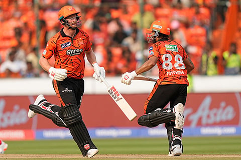 Sunrisers Hyderabad's Heinrich Klaasen, left, and Nitish Kumar Reddy run between the wickets during the Indian Premier League cricket match between Sunrisers Hyderabad and Lucknow Super Giants in Hyderabad, India.