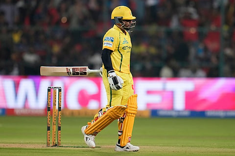 Chennai Super Kings' Sarfaraz Khan leaves the ground after losing his wicket during the Indian Premier League cricket match between Chennai Super Kings and Royal Challengers Bengaluru in Bengaluru, India.