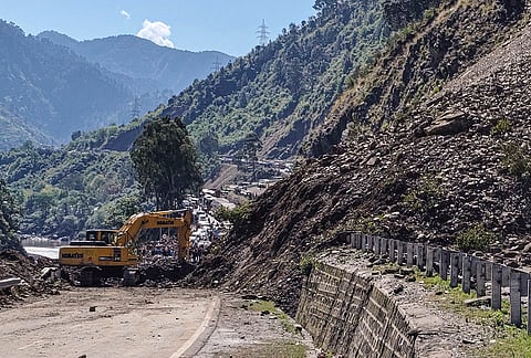 Clearance operation underway after traffic on the Jammu-Srinagar national highway was suspended following landslides and shooting stones triggered by rains, in Ramban, Jammu and Kashmir.