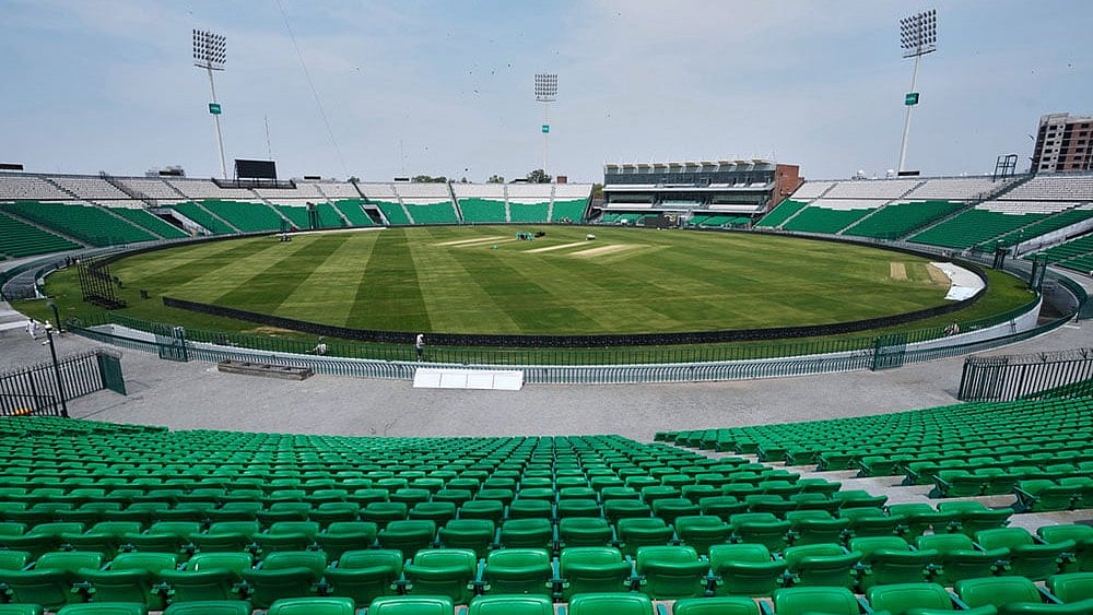 Groundsmen work at the at the Gaddafi Stadium in preparations for upcoming Pakistan's premier domestic T20 the Pakistan Super League, which will take place in empty stadiums due to the recent spike in oil prices, in Lahore, Pakistan. - | Photo: AP/K.M. Chaudary