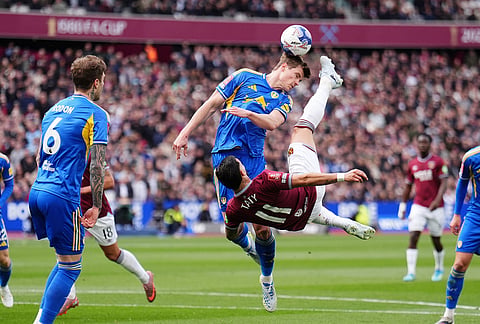 West Ham United's Taty Castellanos, front, and Leeds United's Jaka Bijol in action during the English FA Cup quarterfinal soccer match between West Ham United and Leeds United in London.