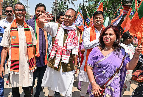BJP candidate for Dispur constituency, Pradyut Bordoloi, centre, greets supporters during the last day of election campaign ahead of the Assam Assembly Election, at Panjabari in Guwahati.