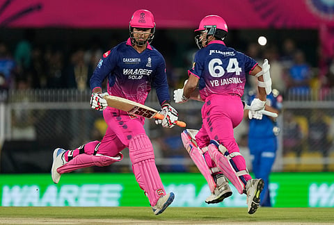 Rajasthan Royals' Yashasvi Jaiswal, right, and Vaibhav Sooryavanshi run between the wickets to score during the Indian Premier League cricket match between Mumbai Indians and Rajasthan Royals in Guwahati.