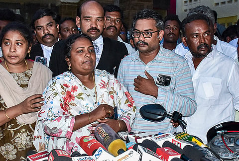 Family members of Jayaraj and his son Bennix, who died after alleged police assault in Sathankulam, address a press conference, in Madurai.