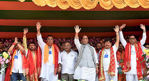 Union Defense Minister Rajnath Singh, West Bengal BJP President Samik Bhattacharya and others during a public meeting, ahead of the state Assembly elections, at Barrackpore, in North 24 Parganas district.