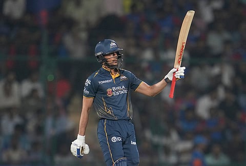 Gujarat Titans' captain Shubman Gill celebrates his fifty runs during the Indian Premier League cricket match between Delhi Capitals and Gujarat Titans in New Delhi.