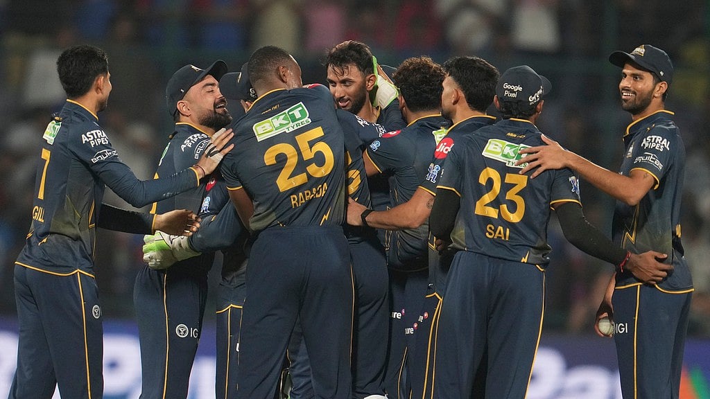 Gujarat Titans' Prasidh Krishna, centre, along with his teammates celebrates after they won the Indian Premier League match against Delhi Capitals in New Delhi. - AP/Manish Swarup