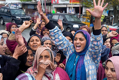 People raise slogans as they gather to celebrate in response to the ceasefire agreement between Iran, the United States and Israel, after US President Donald Trump pulled back from his threats to destroy Iranian civilization, in Srinagar, Jammu and Kashmir.