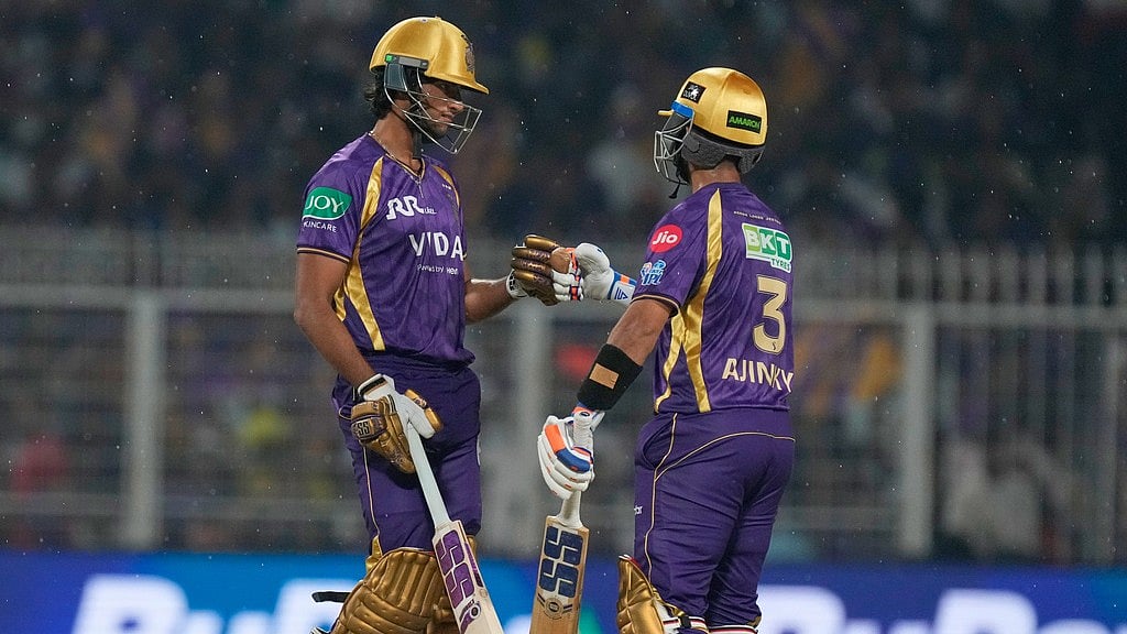 AP : Kolkata Knight Riders' captain Ajinkya Rahane, right, and Angkrish Raghuvanshi bat during the Indian Premier League match against Punjab Kings in Kolkata.