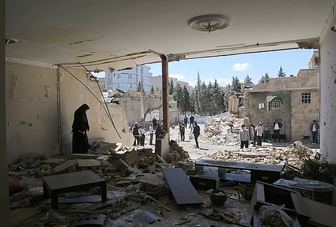 A view of damaged residential buildings in the Vahdat neighborhood following recent strikes attributed to the United States and Israel, with reports indicating that six people who lost their lives and 13 others were injured in the attacks, on April 03, 2026, in Karaj, Iran. 