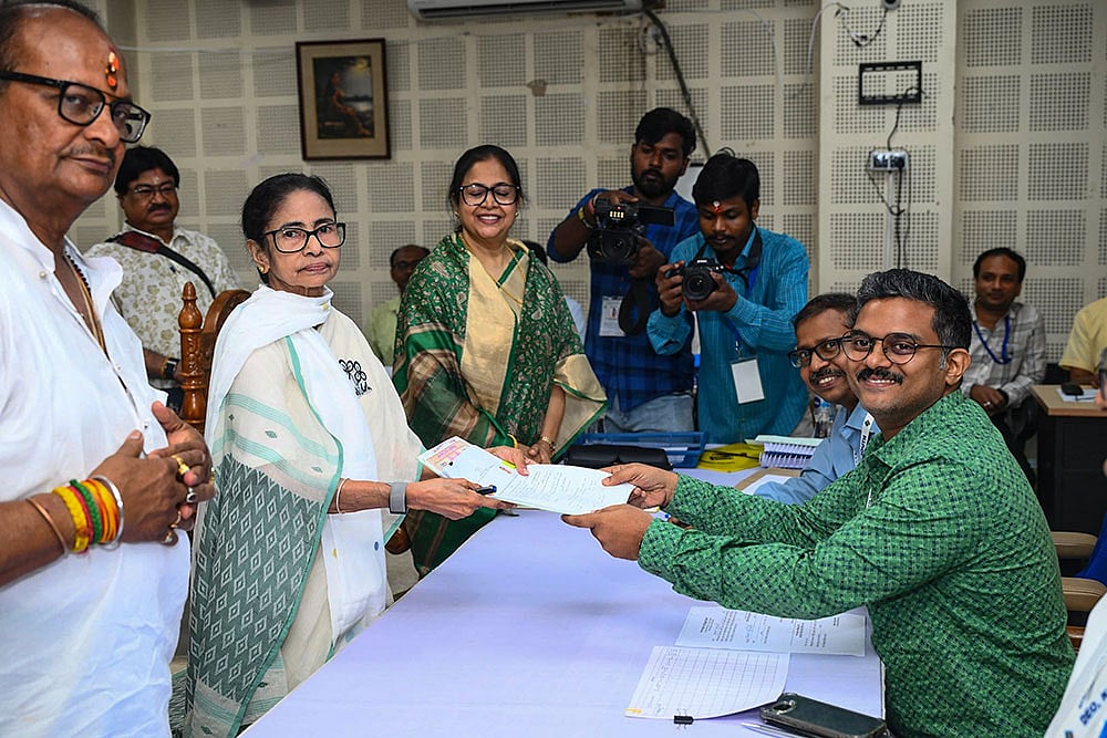 In this image posted on April 8, 2026, West Bengal Chief Minister and TMC candidate from Bhabanipur constituency, Mamata Banerjee, files her nomination in the state Assembly elections, in Kolkata.  - | Photo: @AITCofficial/X via PTI 