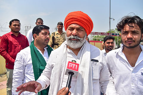 Bharatiya Kisan Union leader Rakesh Tikait speaks to PTI, during a visit, in Prayagraj.
