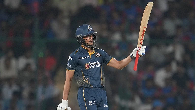 Gujarat Titans' captain Shubman Gill celebrates his fifty runs during the Indian Premier League match between Delhi Capitals and Gujarat Titans in New Delhi. - AP/Manish Swarup