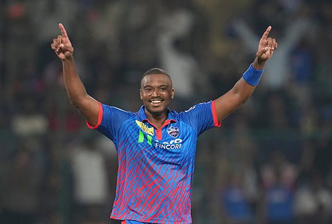 Delhi Capitals' Lungi Ngidi celebrates the wicket of Gujarat Titans' captain Shubman Gill during the Indian Premier League cricket match between Delhi Capitals and Gujarat Titans in New Delhi.