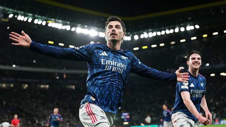 Kai Havertz celebrating after scoring against Sporting Lisbon in UEFA Champions League quarter-final first leg in Portugal. - AP Photo