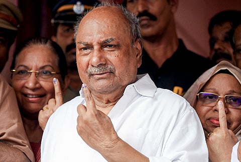 Congress leader AK Antony shows his ink-marked finger after casting vote during the Kerala Assembly elections, at a polling station, in Thiruvananthapuram.