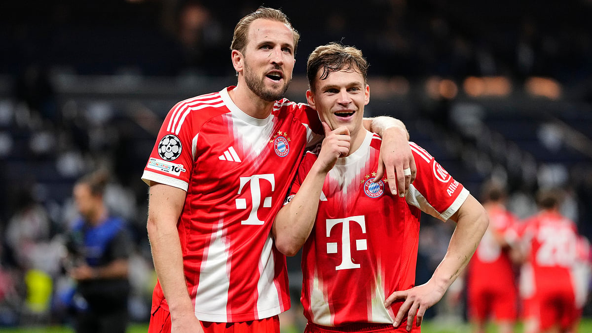 Bayern's Harry Kane, left, and teammate Joshua Kimmich look at the fans after the Champions League quarterfinal first leg soccer match between Real Madrid and Bayern Munich in Madrid, Spain, Tuesday, April 7, 2026. - | Photo: AP/Jose Breton