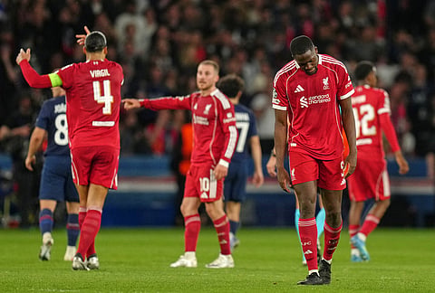 Liverpool's Ibrahima Konate bows his head at the end of the Champions League quarterfinal first leg soccer match between Paris Saint-Germain and Liverpool in Paris.