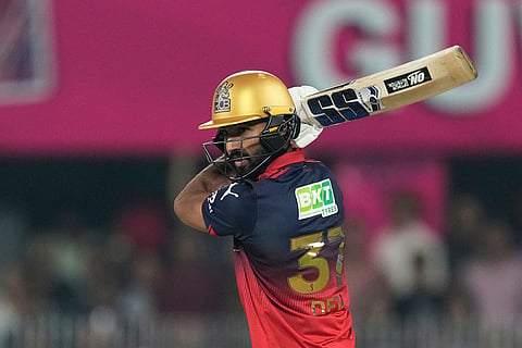 Royal Challengers Bengaluru's Devdutt Padikkal plays a shot during the Indian Premier League cricket match between Royal Challengers Bengaluru and Rajasthan Royals in Guwahati, India.