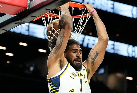 Indiana Pacers forward Obi Toppin (1) dunks during the first half of an NBA basketball game against Brooklyn Nets, in New York.