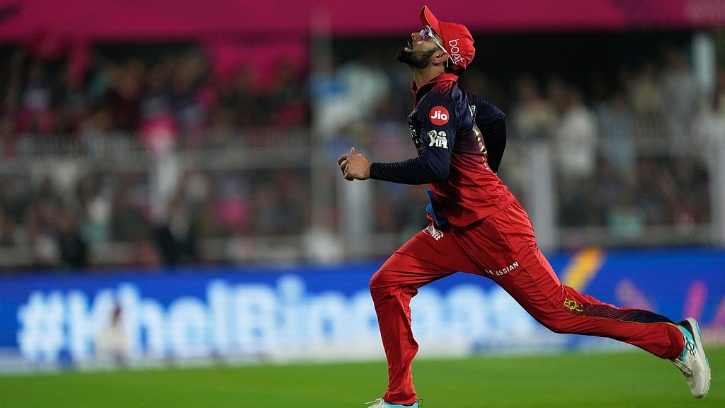 AP/Anupam Nath : Royal Challengers Bengaluru's Virat Kohli about to field a ball during the Indian Premier League match against Rajasthan Royals in Guwahati.