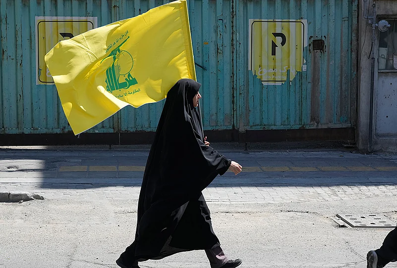 Photos of intense airstrikes in Lebanon- flag of Lebanons militant Hezbollah