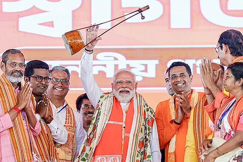 In this image posted on April 9, 2026, Prime Minister Narendra Modi during a public meeting ahead of the West Bengal Assembly elections, in Birbhum, West Bengal.