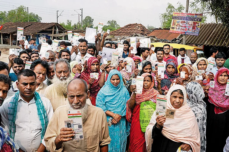 A Wave of Deletions: Voters deleted from the rolls showing their documents at Daulatpur grampanchayat, Milangarh, Malda in West Bengal - | Photo: Sandipan Chatterjee