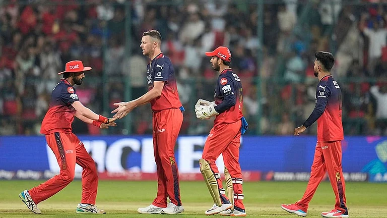 Josh Hazlewood returns into RCB playing XI against LSG after one-match break. - | Photo: AP/Aijaz Rahi