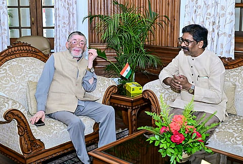 Jharkhand Governor Santosh Gangwar, left, interacts with Chief Minister Hemant Soren during a meeting, at Raj Bhavan in Ranchi, Jharkhand. 