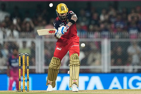 Royal Challengers Bengaluru's Virat Kohli plays a shot during the Indian Premier League cricket match between Royal Challengers Bengaluru and Rajasthan Royals in Guwahati, India.