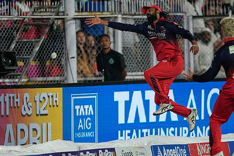 Royal Challengers Bengaluru's Krunal Pandya drops a catch from Rajasthan Royals' Vaibhav Sooryavanshi during the Indian Premier League cricket match between Royal Challengers Bengaluru and Rajasthan Royals in Guwahati, India.