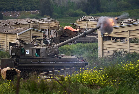 Israeli military mobile artillery unit fires towards southern Lebanon from northern Israel, Thursday, April 9, 2026. 