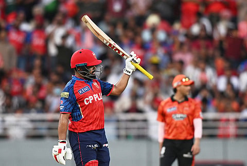 Punjab Kings' Prabhsimran Singh celebrates his fifty runs during the Indian Premier League cricket match between Punjab Kings and Sunrisers Hyderabad in New Chandigarh.