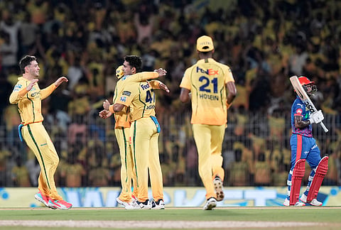 Chennai Super Kings' Anshul Kamboj, centre, celebrates with teammates the wicket of Delhi Capitals' Pathum Nissanka, right, during the Indian Premier League cricket match between Chennai Super Kings and Delhi Capitals in Chennai.