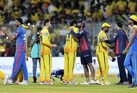 Chennai Super Kings' players being congratulated by Delhi Capitals' players after winning the Indian Premier League (IPL) 2026 T20 cricket match, in Chennai, Tamil Nadu.