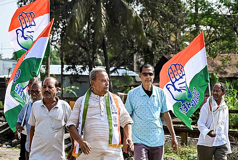 Congress candidate for Santipur Assembly constituency, Alok Chatterjee, centre, during an election campaign ahead of the West Bengal Assembly Election, in Nadia district.