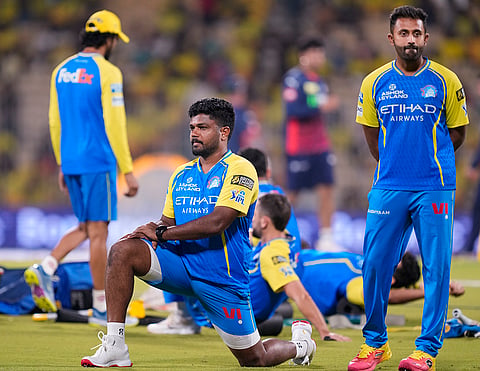 Chennai Super Kings' Sanju Samson, left, warms up before an Indian Premier League (IPL) 2026 T20 cricket match between Chennai Super Kings and Delhi Capitals, in Chennai, Tamil Nadu.