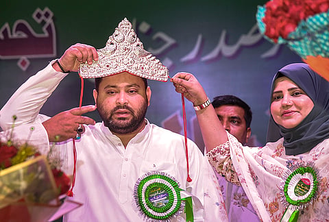 RJD leader Tejashwi Yadav being felicitated during a ceremony organised by the party's minority cell, in Patna, Bihar.