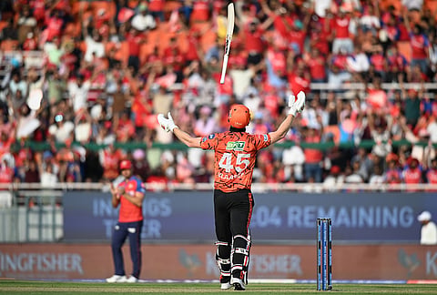 Sunrisers Hyderabad's Heinrich Klaasen tosses his bat in frustration after his dismissal during the Indian Premier League cricket match between Punjab Kings and Sunrisers Hyderabad in New Chandigarh.