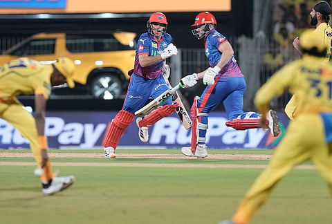 Delhi Capitals' Tristan Stubbs, left, and David Miller run between the wickets to score during the Indian Premier League cricket match between Chennai Super Kings and Delhi Capitals in Chennai.