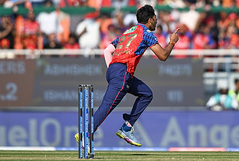 Punjab Kings' Shashank Singh celebrates the dismissal of Sunrisers Hyderabad's Abhishek Sharma during the Indian Premier League cricket match between Punjab Kings and Sunrisers Hyderabad in New Chandigarh.