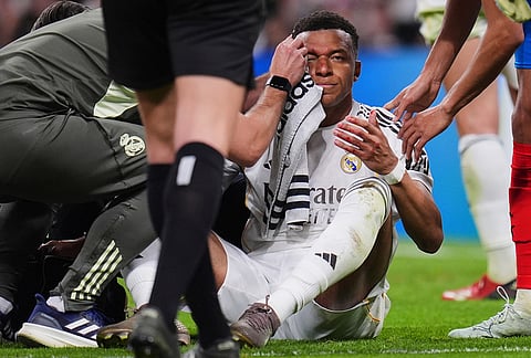 Real Madrid's Kylian Mbappe reacts during a Spanish La Liga soccer match between Real Madrid and Girona in Madrid, Spain.