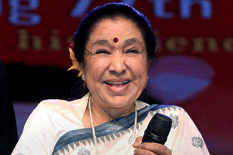 Singer Asha Bhosle passes away at 92 in a hospital, in Mumbai. Bhosle is seen here during an event, in this file photo dated Sept. 8, 2024.