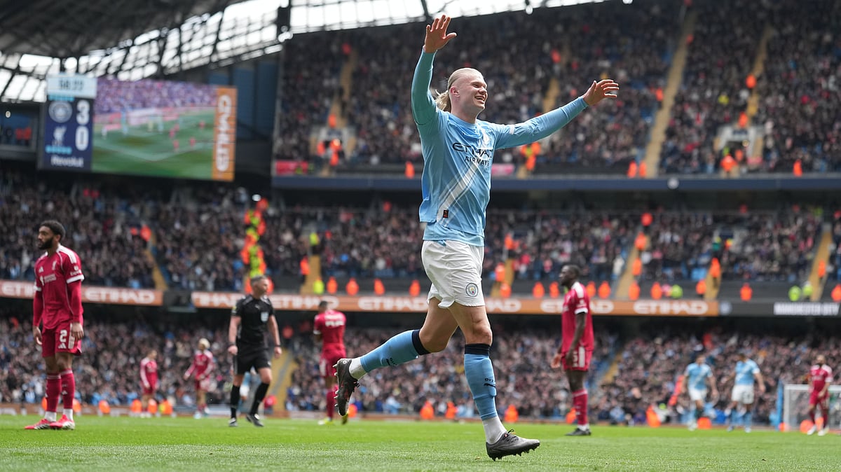 Manchester City's Erling Haaland celebrates after scoring his third goal during the FA Cup quarter-final soccer match between Manchester City and Liverpool in Manchester, England, Saturday, April 4, 2026.  - | Photo: AP/Jon Super
