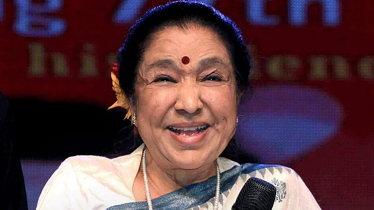 Singer Asha Bhosle passes away at 92 in a hospital, in Mumbai. Bhosle is seen here during an event, in this file photo dated Sept. 8, 2024. (PTI Photo)(PTI04_12_2026_000127B) - Photo: PTI